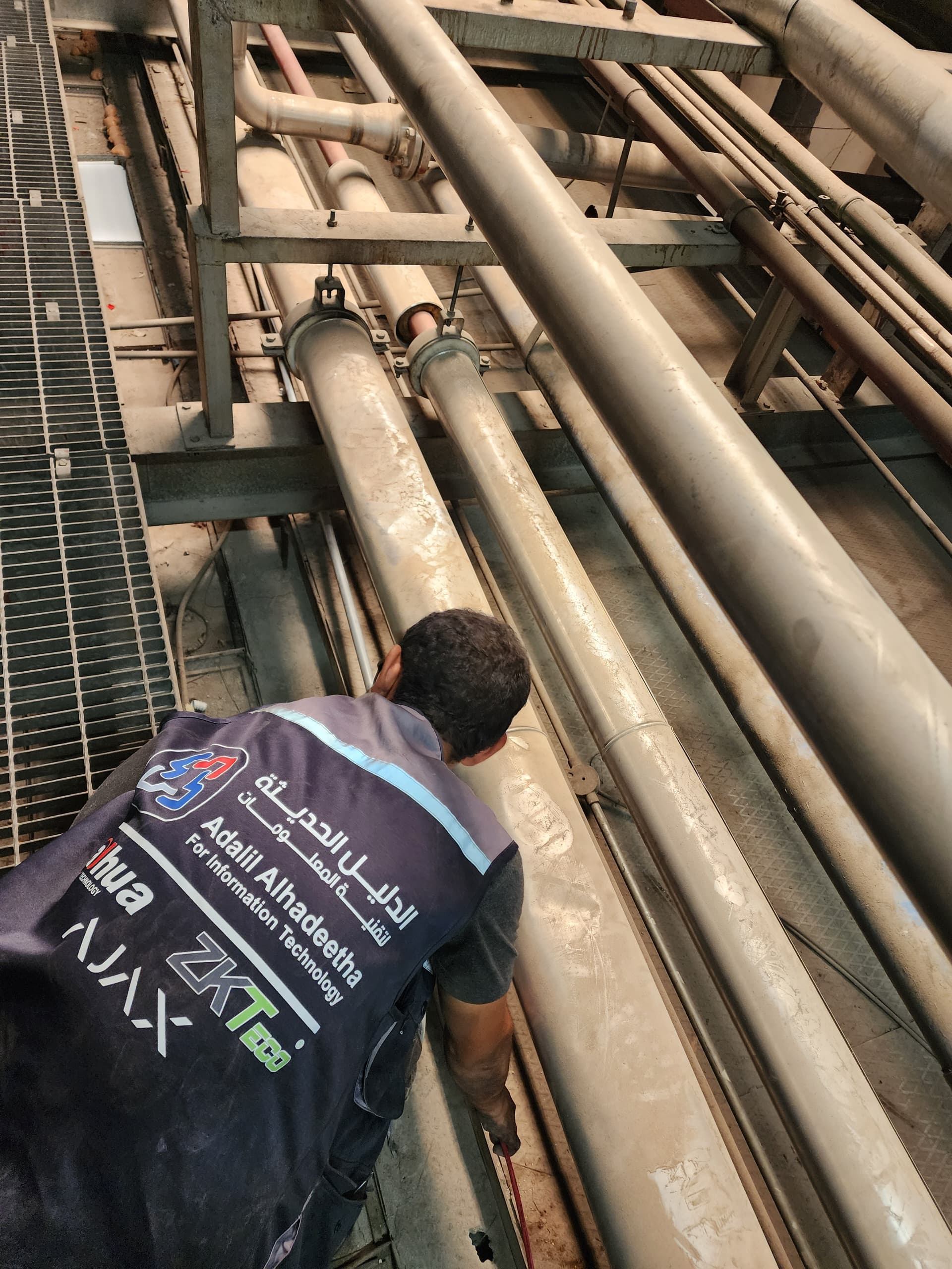 Adalil technician at work in an ABO beverage production environment