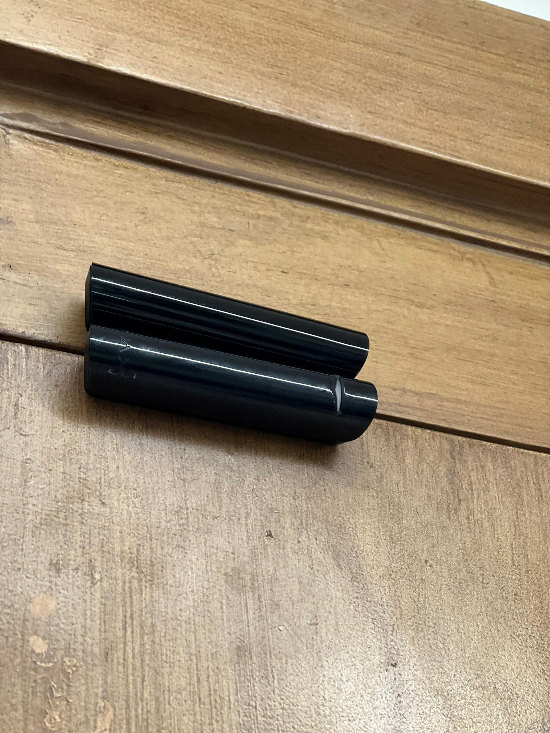 Installed Ajax contact sensor on a building entrance