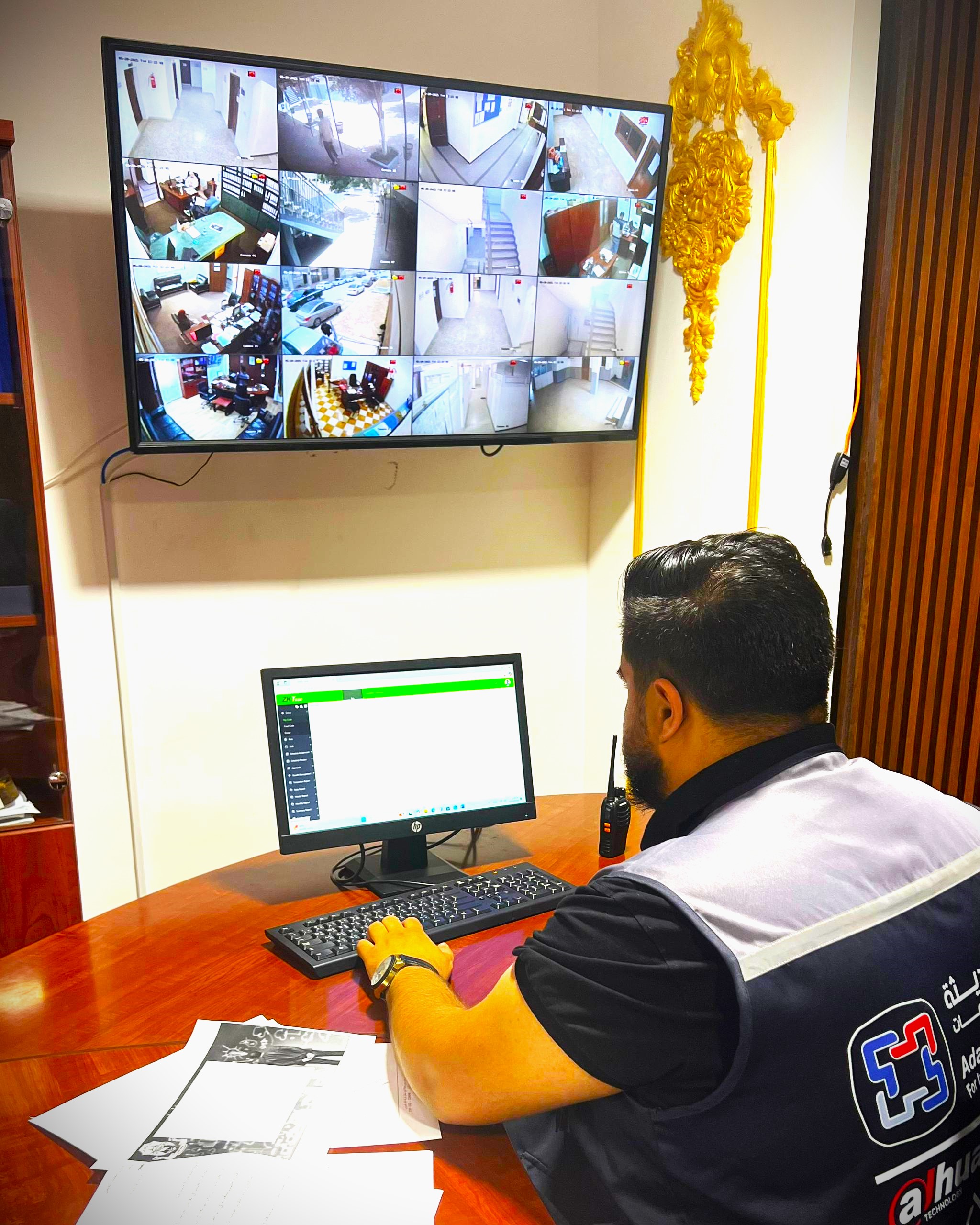 Adalil technician configuring a surveillance display