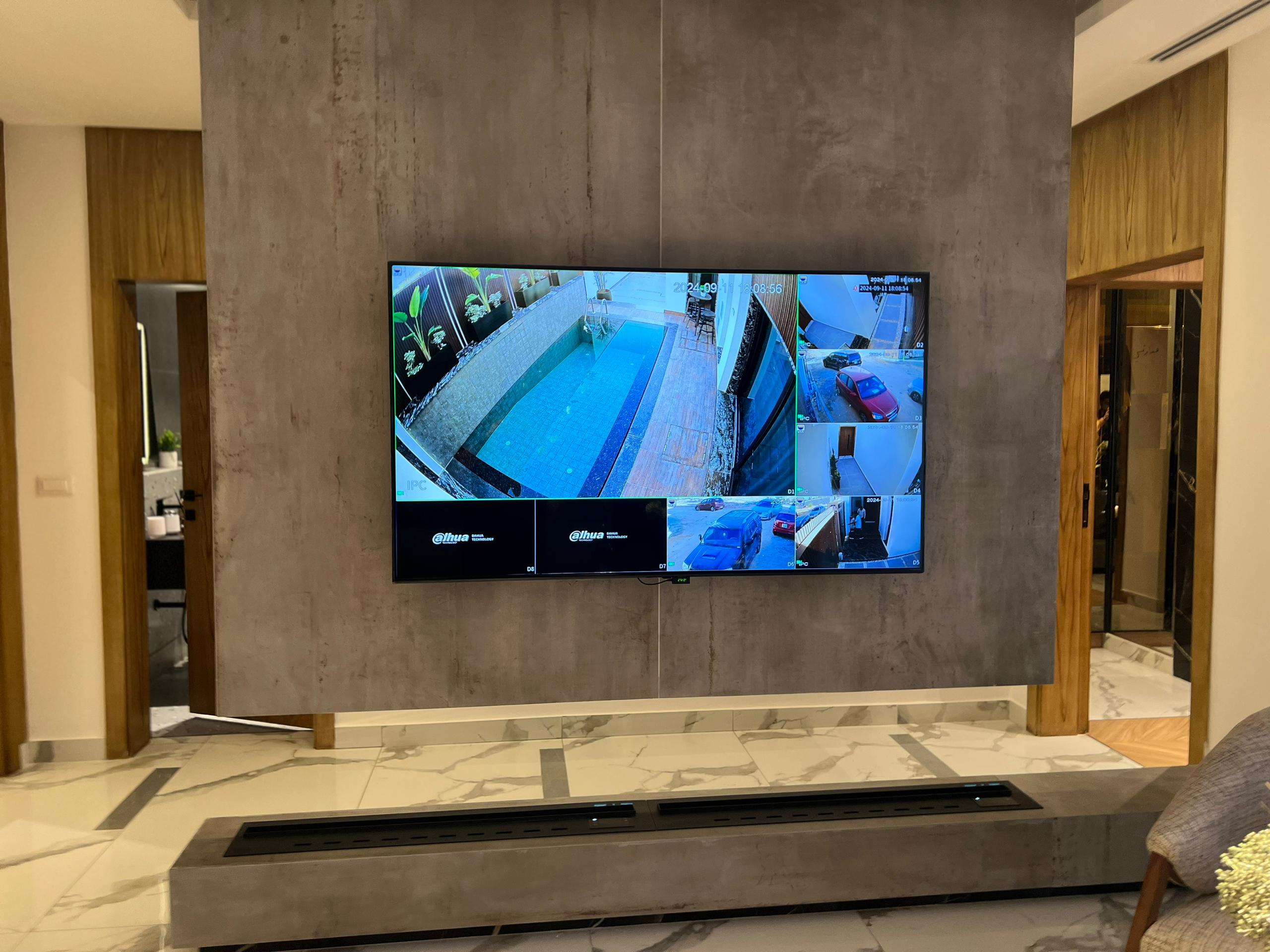 Live multi-camera surveillance display in a completed project